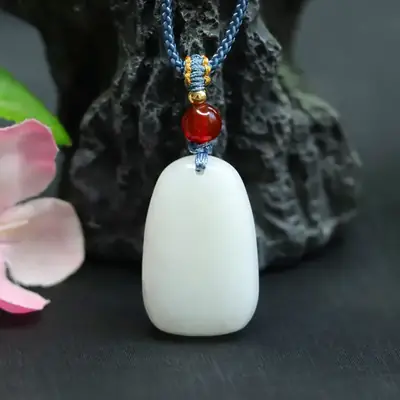 Guan Yu Hetian Jade White Pendant with Red Stone
