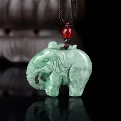 Natural Jade Elephant Pendant with Red Stone Accord