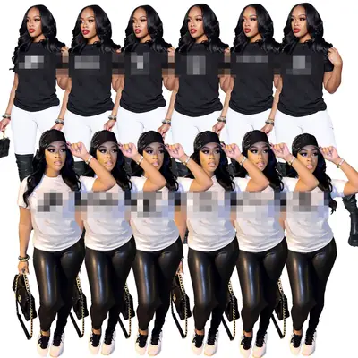 Black Printed T-Shirt with White Pants & Knee-high Boots