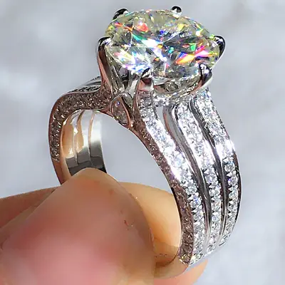 Cao Shi Zircon Ring with 8 Hearts & Arrows Design