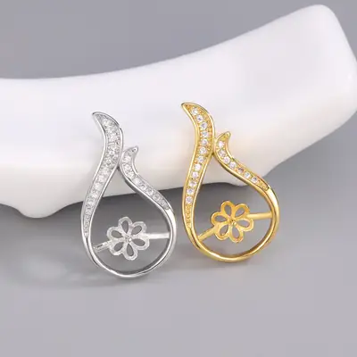 Gold Floral Cross Pendant with Crystal Flower Design