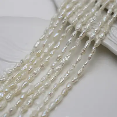 Dream Jewelry Chicken Cream Pearl Wild Pearl Natural Freshwater Baroque Rice Grain Seedless Keshi Flat