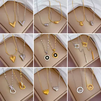 Gold Pendant Necklace with Black Circle Design