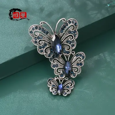 Vintage Silver Butterfly Brooch with Blue Crystal Diamonds