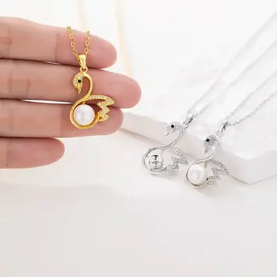 Natural Pearl Pendant with Zircon Swan Design