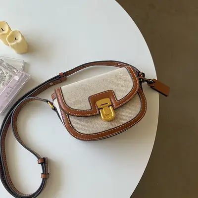 New South Korea Niche Design Leather Patchwork Canvas Saddle Bag