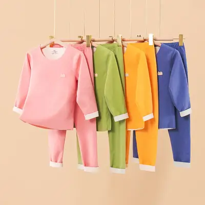New children's brushed warm autumn clothes suit autumn and winter solid color stretch boys and girls underwear seamless home wear