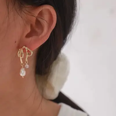 Abstract Melted Bow Pearl Earrings Silver Pin