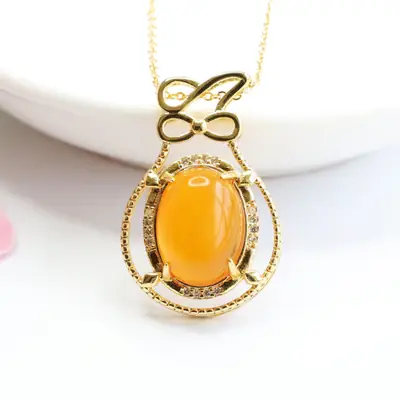 Natural Amber Beeswax Pendant Necklace with Bow