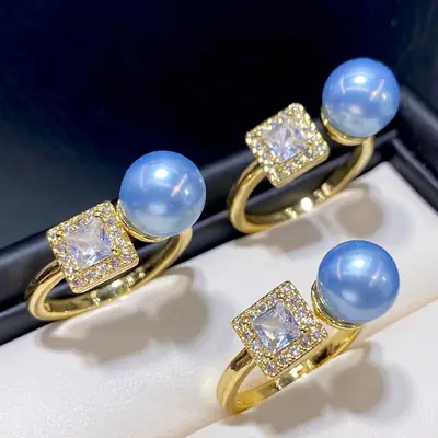 Adjustable Pearl Ring with Glacier Blue Stone