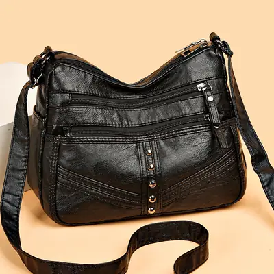 Red Leather Crossbody Bag with Multiple Pockets