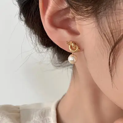 Artificial Pearl Earrings with Knoted Metal Design