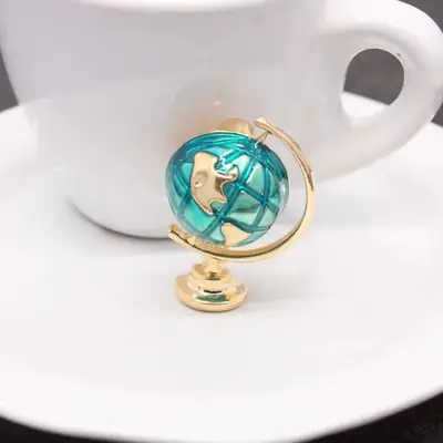 Korean-style Cute Globe Brooch with Gold Finish