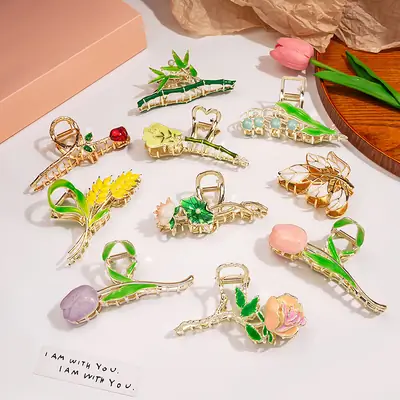 Golden Tulip Hairpin with Green Leaf Design