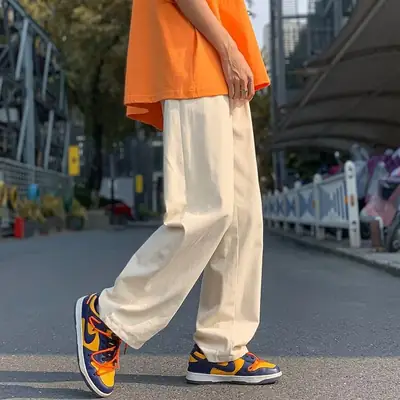 Men's Thin White Sports Pants with Orange Sneakers