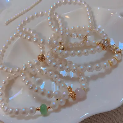 14K Gold Pearl Bracelet with Green Crystal Accents