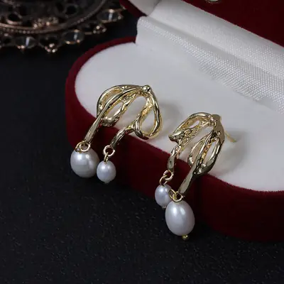 Irregular Bow Baroque Pearl Earrings Wholesale