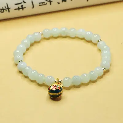 Jadeite Bracelet with Gold Beads and Pearl Drop