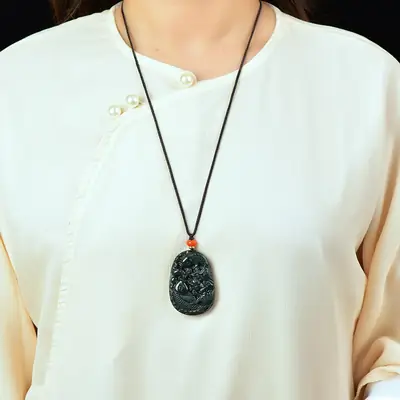 Jade Fish Pendant with Red Charm