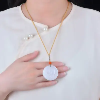 Golden Jade Jade Rabbit Pendant with Leaf Design