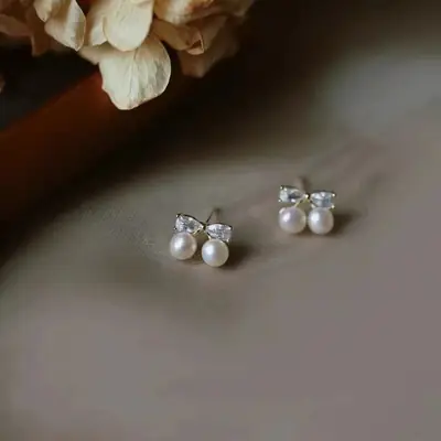 S925 Silver Bow Earrings with Pearl Accents