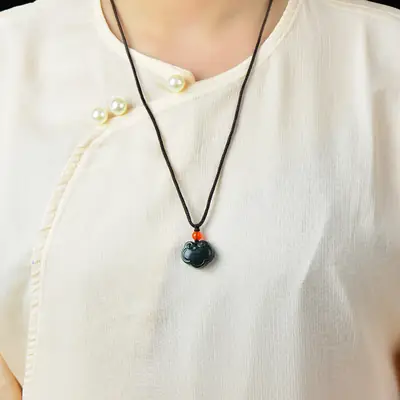 Hetian Jade Ruyi Lock Necklace with Orange Pearl