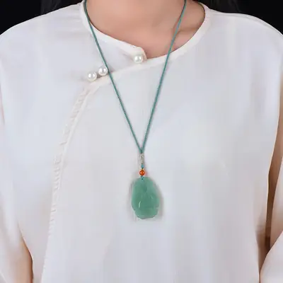 Green Jade Pendant with Red Bead and Embroidered Design