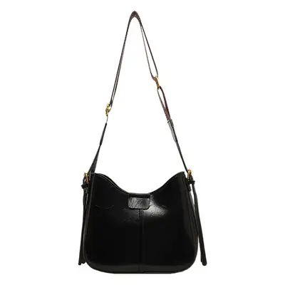Women's Brown Leather Crossbody Bag with Patterned Strap