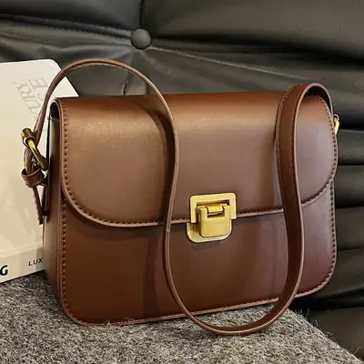 Black Leather Shoulder Bag with Gold Clasp 2023