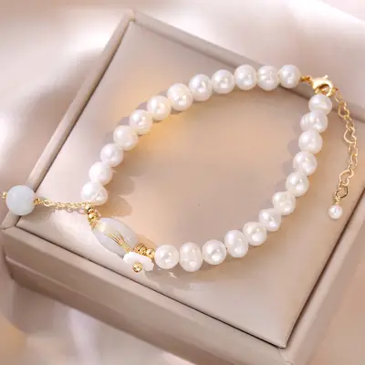 Natural Pearl Bracelet with Transport Jade Design