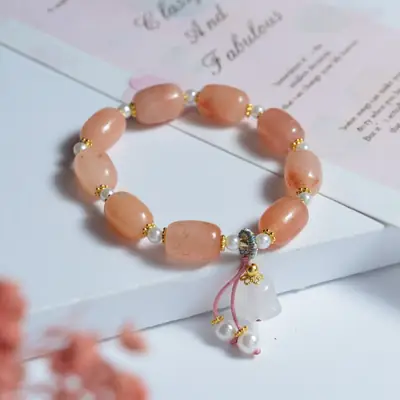 Pink Beaded Windbell Flower Handstring Bracelet