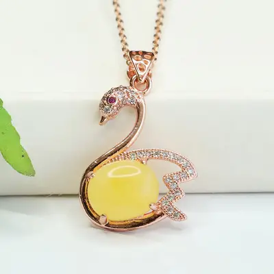 Women's Rose Gold Swan Necklace with Yellow Amber Pendant