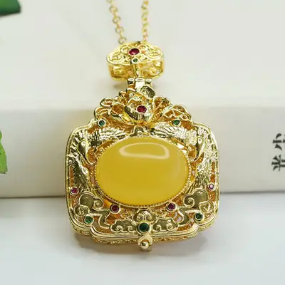 Yellow Amber Phoenix Necklace with Golden Finish