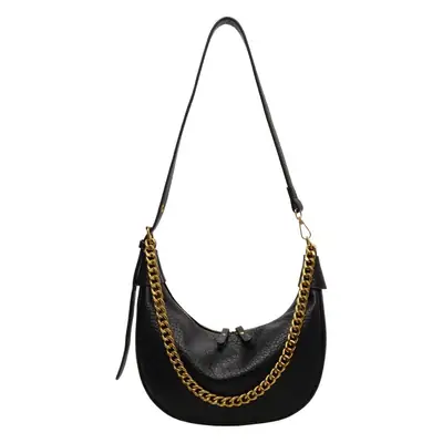 Women's tan chain bag with gold strap and crescent design