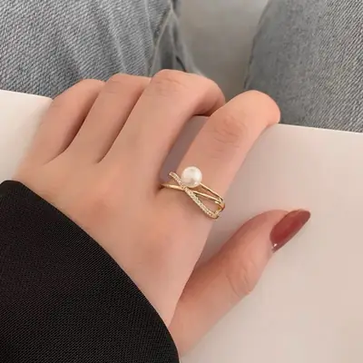 Women's Pearl Ring with Gold Plated Design