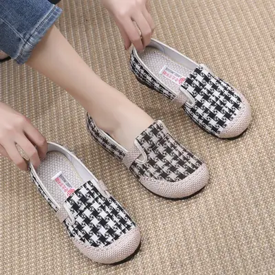 Women's Black Houndstooth Slip-on Shoes