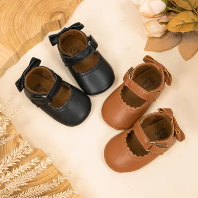 Foreign trade new princess shoes leather material women's baby shoes bow anti-slip rubber bottom baby shoes baby shoes