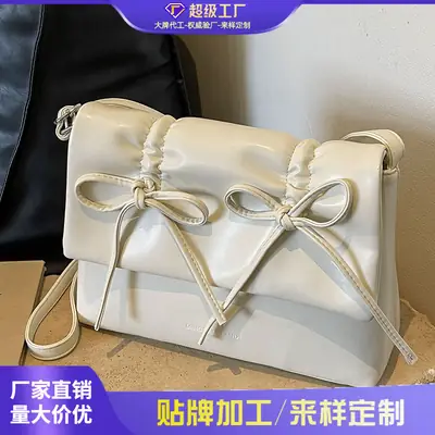 Women's Silver Bow Crossbody Bag 2026