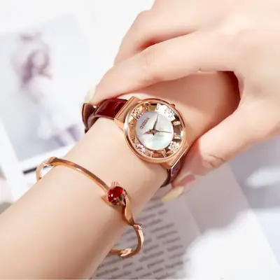 Oshga Women's Quartz Watch with Green Diamond Dial