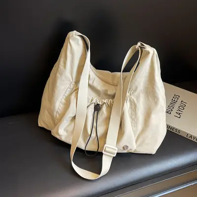 Pink Folded Shoulder Bag with Drawstring Closure