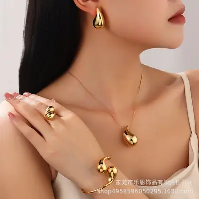 Golden Hollow Water Drop Necklace & Earrings Set for Women
