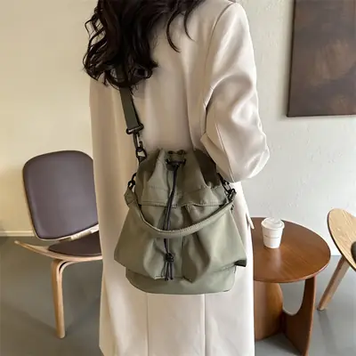 Women's Light Grey Bucket Bag with Drawstring Closure