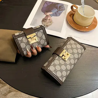 Cross-border high-end wallet women's new short multi-card three-fold buckle hand-held long wallet for hair