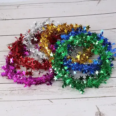 Christmas Tree Decor with Stars, Stars, and Pinecones
