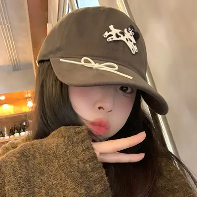 Women's Cartoon Cap with Bow Duck Tongue Design