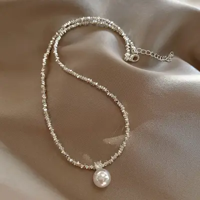 Feminine Pearl Clavicle Necklace with Broken Silver Finish