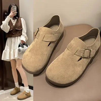 Women's Beige Slip-on Birkenstocks with Buckle Strap