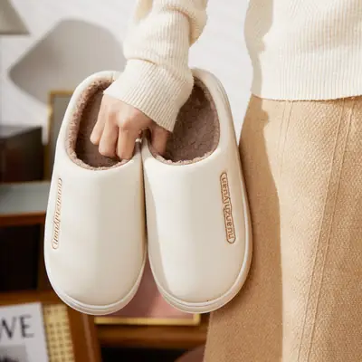 Nanbo Wan waterproof cotton slippers women's winter indoor home simple warm fleece-lined lovers Baotou slippers men's wholesale