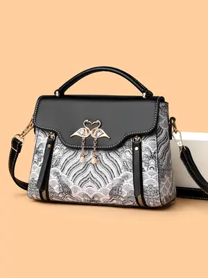 Women's Black Leather Crossbody Bag with Red Accessories