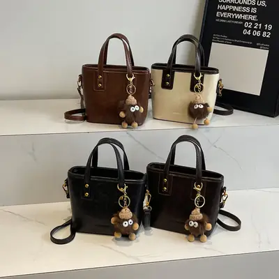 Women's Small Square Handbag with Pom Pom Detail